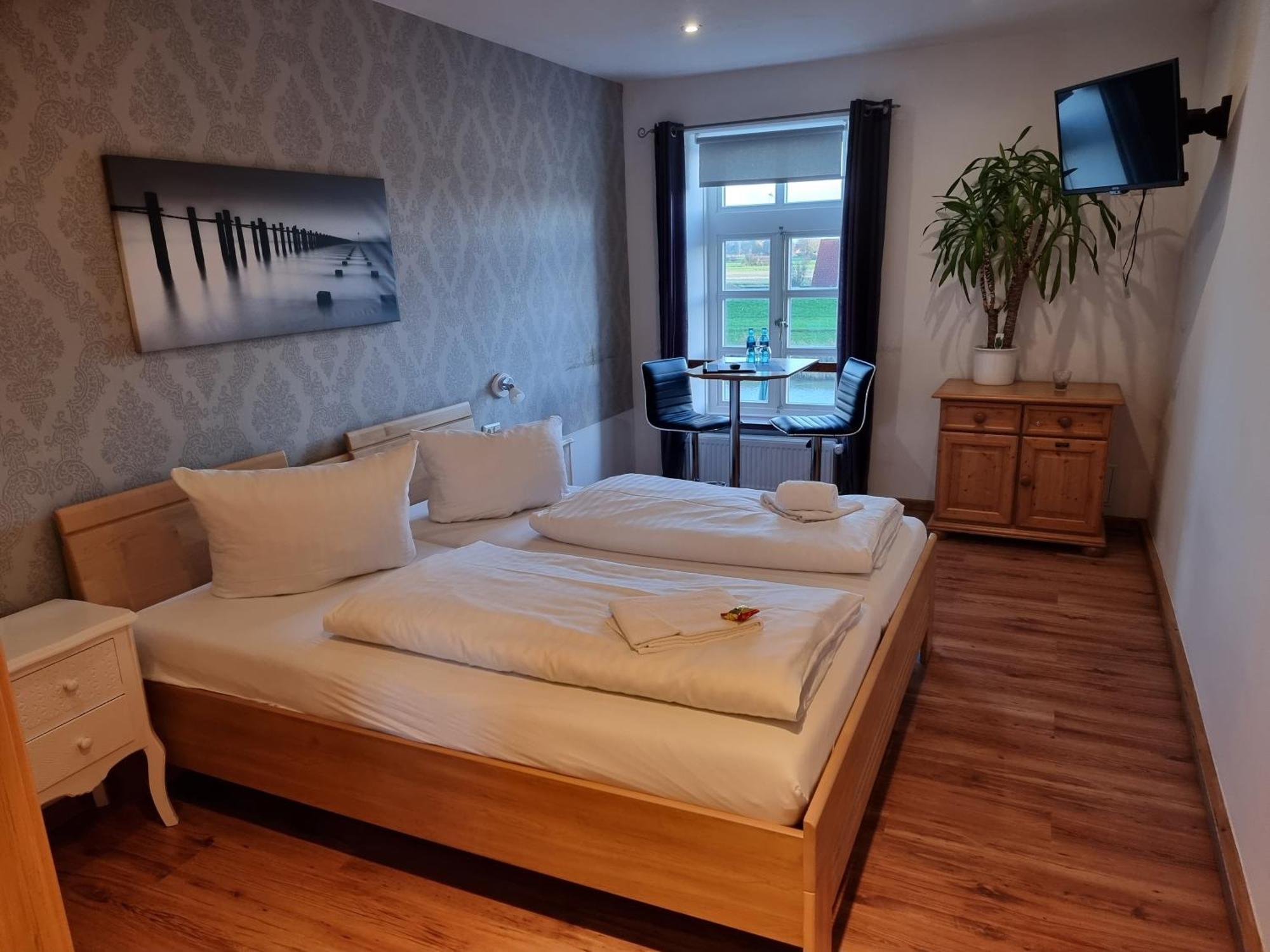 Hotel Packhaus Hooksiel Habitación foto